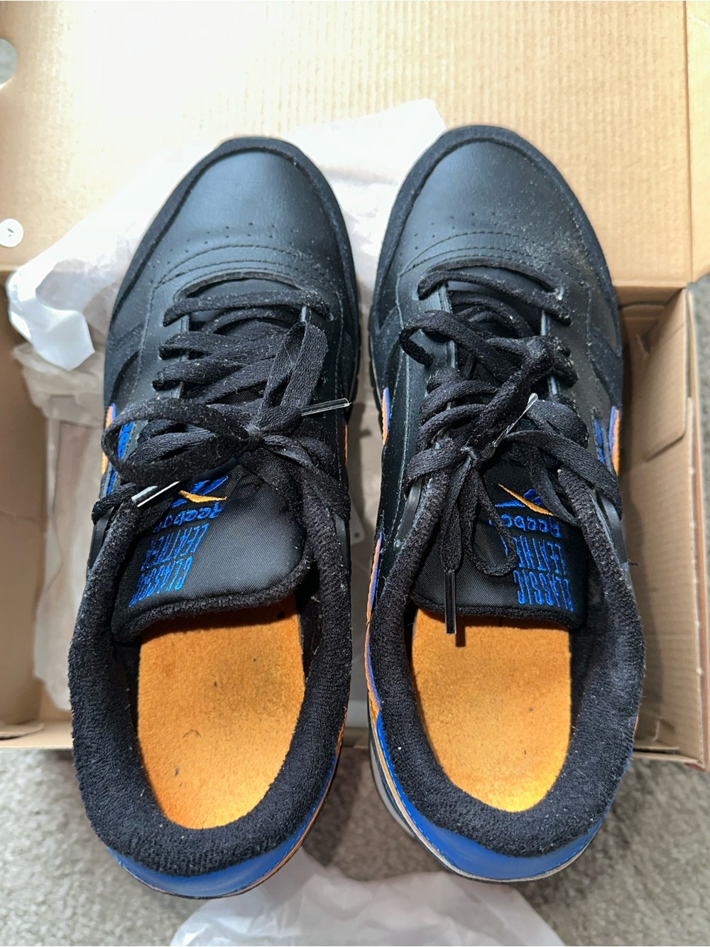 Reebok Black Sneakers with Blue and Orange Accents